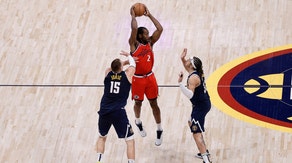 Los Angeles Clippers' Kawhi Leonard looks to pass with Denver Nuggets C Nikola Jokic and PF Aaron Gordon defending him during Game 2 in the first round of the 2025 NBA Playoffs at Ball Arena. (Photo Credit: Isaiah J. Downing-Imagn Images)
