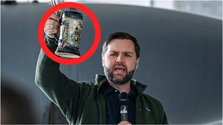 Vice President JD Vance served beer to soldiers at Ramstein Air Base in Germany. Watch a video of the awesome moment. (Photo by Kenny Holston - Pool/Getty Images)