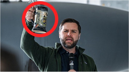 Vice President JD Vance served beer to soldiers at Ramstein Air Base in Germany. Watch a video of the awesome moment. (Photo by Kenny Holston - Pool/Getty Images)