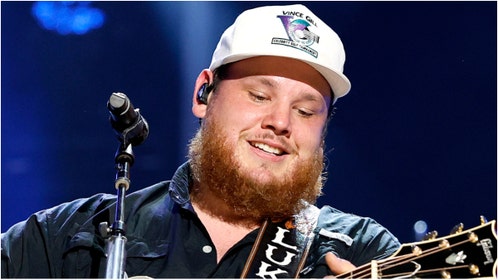 Country star Luke Combs previewed two new unreleased songs. Watch videos of both songs. (Photo by Jason Kempin/Getty Images)