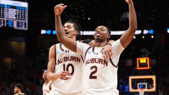 Auburn Tigers guard Chad Baker-Mazara and guard Denver Jones celebrate during the 2025 NCAA tournament.