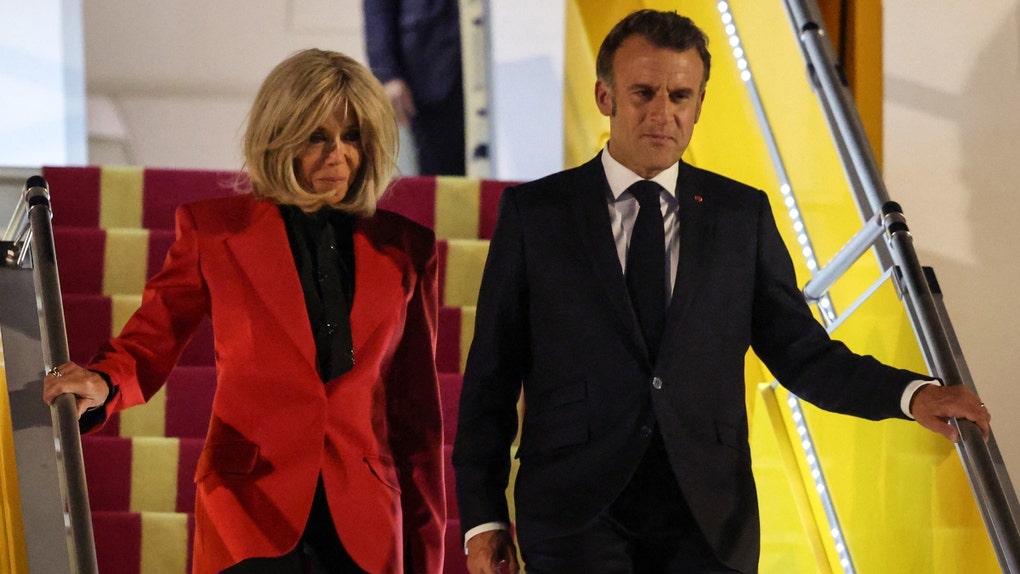 French President Emmanuel Macron's Wife Brigitte Shoved His Face With Two Hands