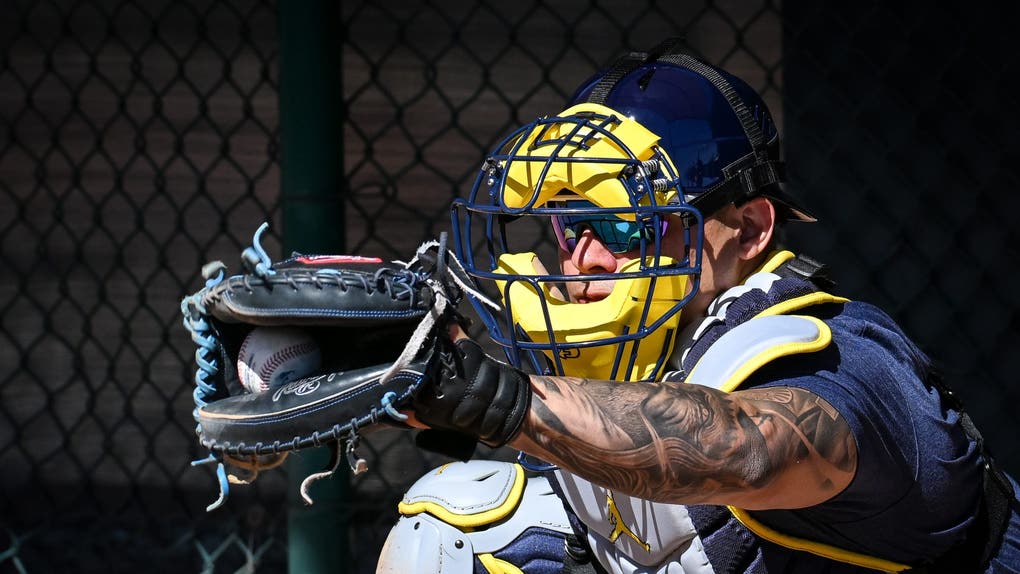 Milwaukee Brewers catcher William Contreras catches in the bullpen during spring training workouts. 