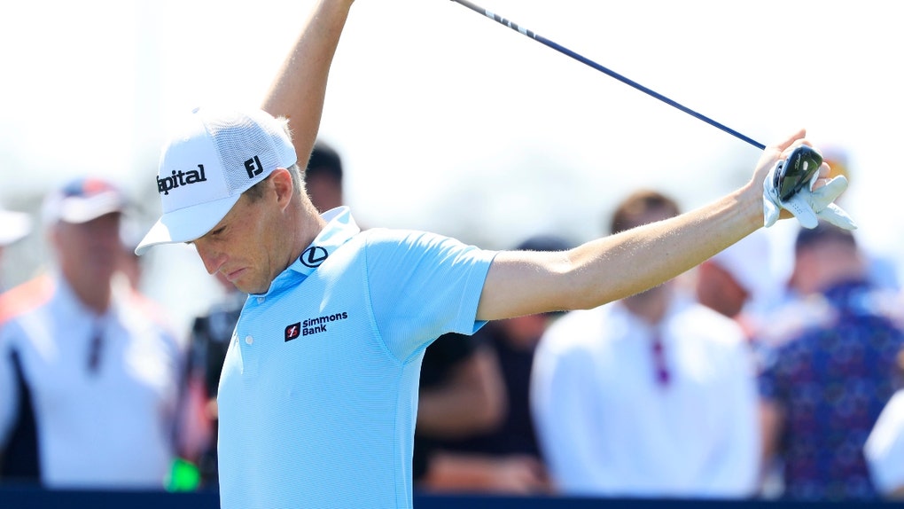 Will Zalatoris stretching on the tee
