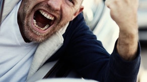 A man gets his ass kicked hanging out of his car's window during a road rage incident in Ohio