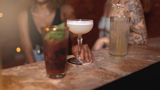 Two Arizona moms were arrested for leaving their four small children unattended in a car while they had drinks at the bar