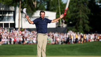 Scottie Scheffler celebrates his win at the PGA Championship