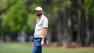 Scottie Scheffler looking down a fairway