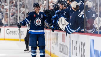 Mark Scheifele Celebrates With His Winnipeg Jets Teammates