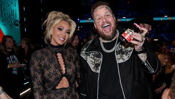 Jelly Roll's wife Bunnie XO posted a video of herself flashing her boobs at her husband inside a hockey arena