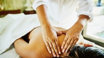 woman books massage at brothel