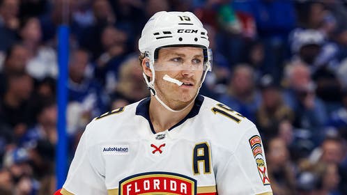 Matthew Tkachuk chews his mouthpiece while on the ice