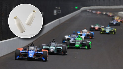 IndyCars practicing for the Indianapolis 500 and bottles of milk.