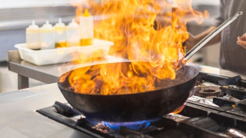 woman nearly burns her house down in video after frying pan catches fire