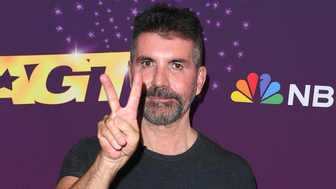 couple asked simon cowell to judge them having sex