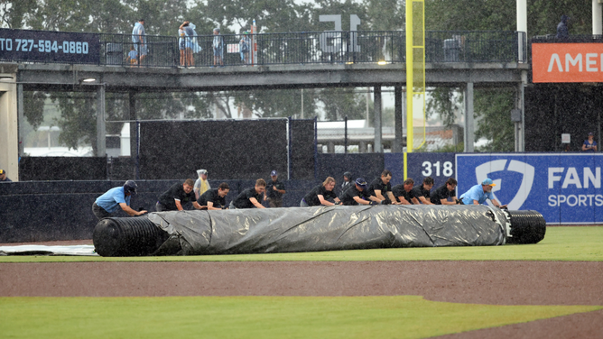 Rays Fans Get Commemorative Ponchos To Celebrate Team's First-Ever Rain Delay