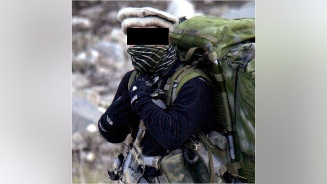 An unknown commando during the Battle of Tora Bora. (Photo by ROMEO GACAD/AFP via Getty Images)