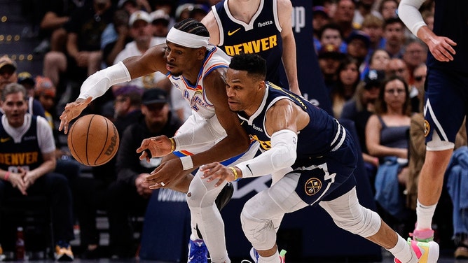 Oklahoma City Thunder PG Shai Gilgeous-Alexander and Denver Nuggets PG Russell Westbrook fight for a loose ball during Game 4 of the Western Conference Semifinals in 2025 NBA Playoffs. (Photo Credit: Isaiah J. Downing-Imagn Images)