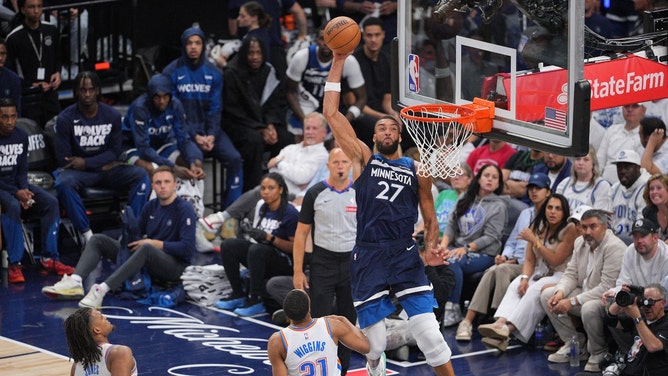 Minnesota Timberwolves C Rudy Gobert catches a lob against Oklahoma City Thunder during Game 3 of the 2025 Western Conference Finals. (Photo Credit: Brad Rempel-Imagn Images)