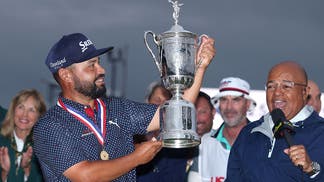 JJ Spaun holding U.S. Open trophy at Oakmont
