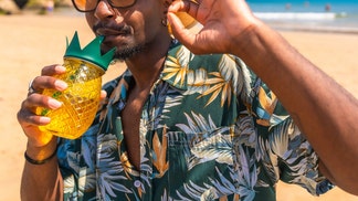 horny women on a cruise flirt with man wearing a pineapple shirt swingers