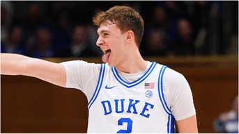 The NCAA is looking at men's basketball moving from halves to quarters. Will it happen? How would it work? (Photo by Grant Halverson/Getty Images)