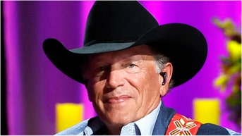 Country music icon George Strait gifted a wounded veteran a free home during a recent show. Watch a video of the touching moment. (Photo by Jason Kempin/Getty Images)