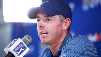 Rory McIlroy speaking into a microphone at the RBC Canadian Open