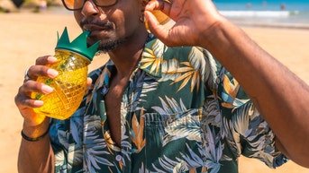 horny women on a cruise flirt with man wearing a pineapple shirt swingers