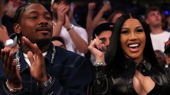 stefon diggs and cardi b in a castle in france