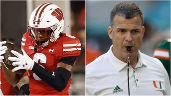The Miami Hurricanes are being sued by the Wisconsin Badgers after alleging tampering with Xavier Lucas to get him to transfer. What are the details of the case? (Photo by John Fisher/Getty Images and Michael Pimentel/ISI Photos/Getty Images)