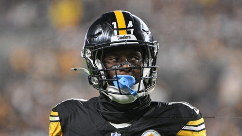 George Pickens looks to the sideline