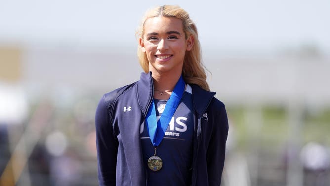 Transgender athlete AB Hernandez of Jurupa Valley poses with gold medal after winning the girls long jump at 19-3 1/2 (5.88m) during the CIF Southern Section Masters Meet at Moorpark High School on May 24, 2025 in Moorpark, California. (Photo by Kirby Lee/Getty Images)