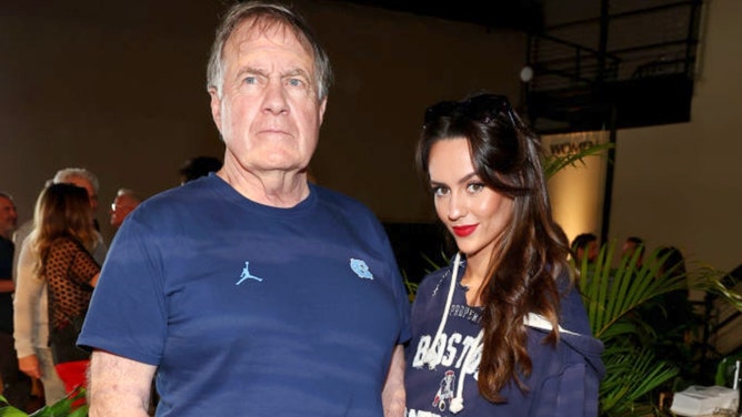 Bill Belichick and Jordon Hudson.