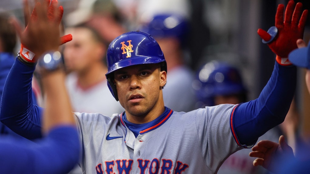 Juan Soto celebrating in dugout