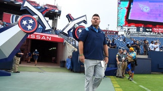 Jon Robinson walking onto the field in Nashville