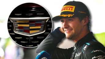 Jak Crawford and a Cadillac logo