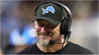 A viral AI video of Dan Campbell as a baby giving hype speeches is going viral. Watch the footage. How are these AI videos made? (Photo by Mike Mulholland/Getty Images)