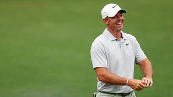 Rory McIlroy laughing and smiling