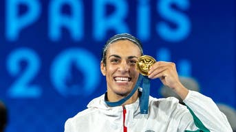 Imane Khelif with the Olympic gold medal