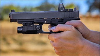 A viral video shows a gun instructor teaching people how to carry without a round in the chamber, and the reactions are overwhelmingly negative. (Credit: Getty Images Creatives)