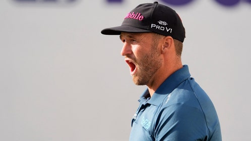 Wyndham Clark reacting to a missed putt.