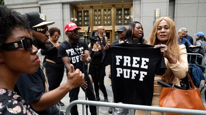 diddy fans break out baby oil and celebrate verdict outside the courthouse
