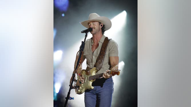 NASHVILLE, TENNESSEE - JUNE 05: EDITORIAL USE ONLY. Riley Green performs on the main stage during CMA Fest 2025 at Nissan Stadium on June 05, 2025 in Nashville, Tennessee. (Photo by Jason Kempin/Getty Images)