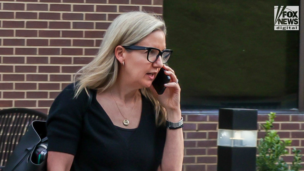 Cracker Barrel CEO Julie Felss Masino walks out of an office in Tennessee.