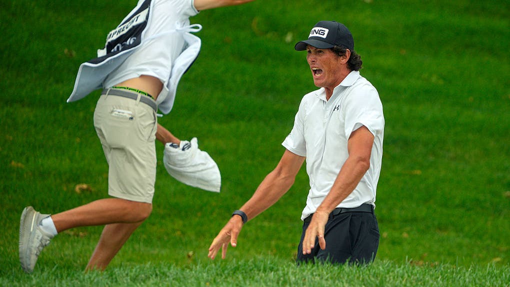 Christo Lamprecht and caddie celebrate Korn Ferry Tour victory