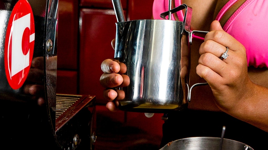 man arrested for trying to pull bikini barista into his car