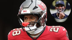 Shilo Sanders and Deion Sanders smiling