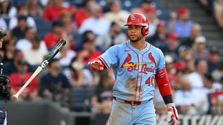 Wilson Contreras tosses bat.