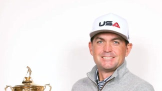 Keegan Bradley holding the Ryder Cup Trophy